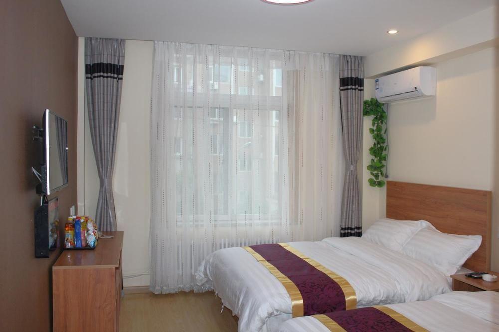 Dalian Kai Bin Business Inn Buitenkant foto