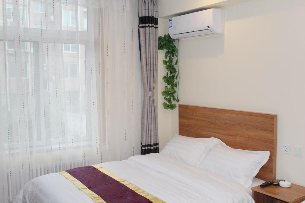 Dalian Kai Bin Business Inn Buitenkant foto